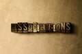 ASSOCIATIONS - close-up of grungy vintage typeset word on metal backdrop