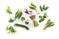 Assorment of fresh green vegetables isolated on white background