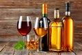 Assorted alcoholic drinks with wine and spirits on wooden table Royalty Free Stock Photo