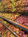 Assorted apples lying in a showcase in a supermarket