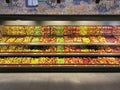 Assorted apples lying in a showcase in a supermarket