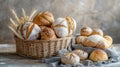 Assorted artisan bread in baskets with wheat on rustic table
