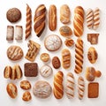 Assorted Artisan Bread Loaves Displayed On White Background