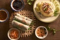 Assorted asian dinner, vietnamese food. Chicken rice, spring rolls Royalty Free Stock Photo