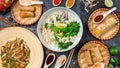 Assorted asian dinner, vietnamese food. Pho ga, pho bo, noodles, spring rolls Royalty Free Stock Photo