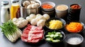 Assorted Asian Hot Pot Ingredients on Dark Royalty Free Stock Photo
