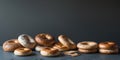 Assorted bagels and breads on a dark slate background with ample copy space on the right side