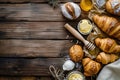 Assorted Baked Goods on Rustic Wooden Table - Cozy Bakery Scene Royalty Free Stock Photo