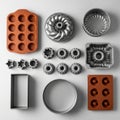 Baking molds arranged on a light surface featuring different shapes and Royalty Free Stock Photo