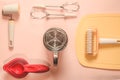 Assorted baking utensils on a pink background Royalty Free Stock Photo