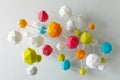 Assorted balls of various colors suspended from a string in a visually striking display, Construct a visually stimulating Royalty Free Stock Photo