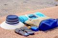 Assorted beach accessories on the sand Royalty Free Stock Photo