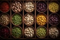Assorted beans neatly placed in small wooden vessels, seen from above Royalty Free Stock Photo