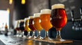 Assorted Beer Glasses Aligned on Bar Counter Royalty Free Stock Photo