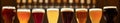 Assorted Beer Glasses in a Row Royalty Free Stock Photo