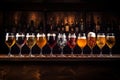 Assorted beer glasses on wooden table, rich colors and textures for brewery or pub concept Royalty Free Stock Photo