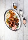 Assorted beer snacks. Sausages, croutons, fried onion rings, shrimps Royalty Free Stock Photo