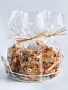 Assorted Biscotti Cantucci Biscuits Cookies in plastic wrap packaging for sale. Italian dessert cookies close up, selective focus Royalty Free Stock Photo
