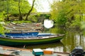 Different boats for rent tied to small pier on Lough Leane, the largest and northernmost of the three lakes of Killarney National