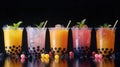 Assorted boba tea on black background featuring various colourful drinks with tapioca pearls and fruit flavours. Iced milkshakes, Royalty Free Stock Photo