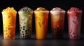 assorted boba tea on a black background