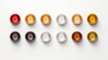 Assorted bottle caps in a row on a white background. Top view. Concept of bottle tops, packaging, recyclable materials Royalty Free Stock Photo