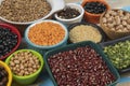 assorted bowls with raw grain and seeds top view