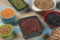 assorted bowls with raw grain and seeds top view