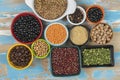 assorted bowls with raw grain and seeds top view