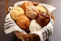 assorted bread rolls in a woven basket Royalty Free Stock Photo