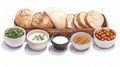 Assorted Breads with Dips and Condiments on Wooden Tray for Culinary Presentation Royalty Free Stock Photo