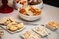 Assorted breads and pates arranged on a buffet table