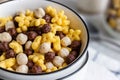 Assorted breakfast cereals: chocolate balls and honey stars Royalty Free Stock Photo