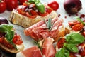 Assorted bruschetta with various toppings. Appetizing bruschetta or crudo crostini. Variety of small sandwiches. Mix bruschetta on Royalty Free Stock Photo