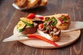 Assorted bruschetta with various toppings.Appetizing bruschetta.Variety of small sandwiches.Mix bruschetta Royalty Free Stock Photo