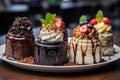 Assorted cakes with cream, chocolate and berries dessert assorted variety of different decorated cakes Royalty Free Stock Photo