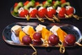 Assorted canapes on metal trays. Delicious appetizers for a buffet.