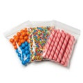 Assorted candy packets isolated on white background Royalty Free Stock Photo
