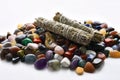 Assorted Chakra Crystals and White Sage Smudge Sticks Royalty Free Stock Photo