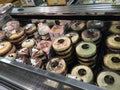 Assorted cheese cakes displayed supermarket bakery section in refrigerated case