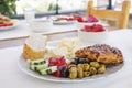 Assorted cheeses and olives, served with vegetables. Traditional Turkish food for breakfast in Goreme. Cappadocia Royalty Free Stock Photo