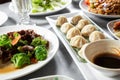 assorted Chinese entrees, beef broccoli, xiaolongbao dumplings Royalty Free Stock Photo