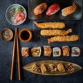 Assorted Chinese japanese food set. Gyoza dumplings, xiao long bao, shao mai, gunkan, fried takoyaki, maki, uramaki, nigiri, Deep Royalty Free Stock Photo