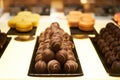 Assorted chocolate candies in a pastry shop, close-up. Royalty Free Stock Photo