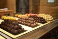 Assorted chocolate candies in a pastry shop, close-up. Royalty Free Stock Photo