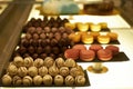 Assorted chocolate candies in a pastry shop, close-up. Royalty Free Stock Photo
