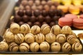 Assorted chocolate candies in a pastry shop, close-up. Royalty Free Stock Photo