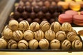 Assorted chocolate candies in a pastry shop, close-up. Royalty Free Stock Photo