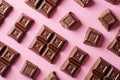 Assorted chocolate candies on pink background, top view. Chocolate pralines flat lay. Handmade chocolate candy sweets Royalty Free Stock Photo