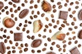 Assorted chocolate candy on the background of coffee beans isola Royalty Free Stock Photo